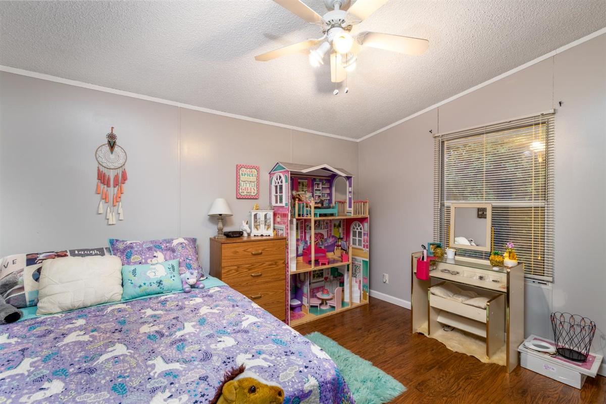 1861 Navigation Point Goodview, VA 24095 - Photo 19 of 26 a bedroom with furniture and a bed