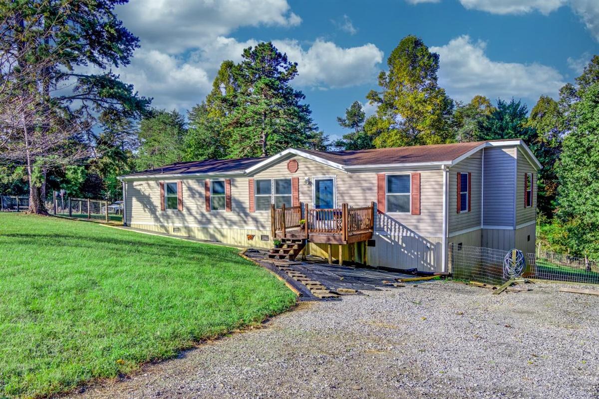 1861 Navigation Point Goodview, VA 24095 - Photo 2 of 26 a view of a house with backyard and sitting area