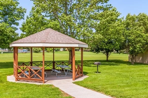 a garden view with a seating space