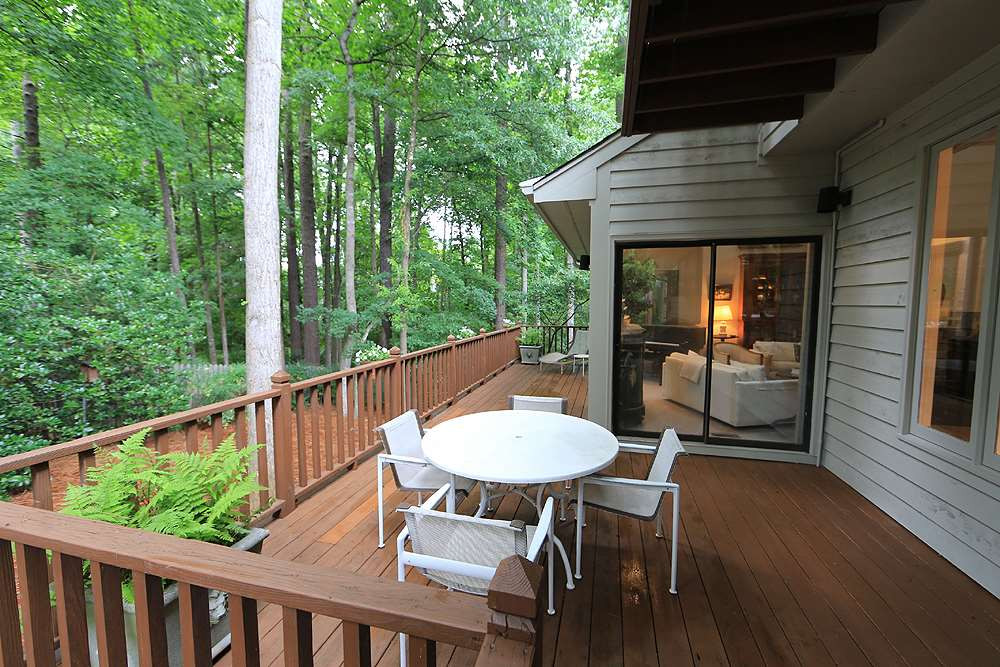 1504 Pecore Place Raleigh, NC 27615 - Photo 21 of 25 Large back deck that can be accessed from the living room and family room. Deck