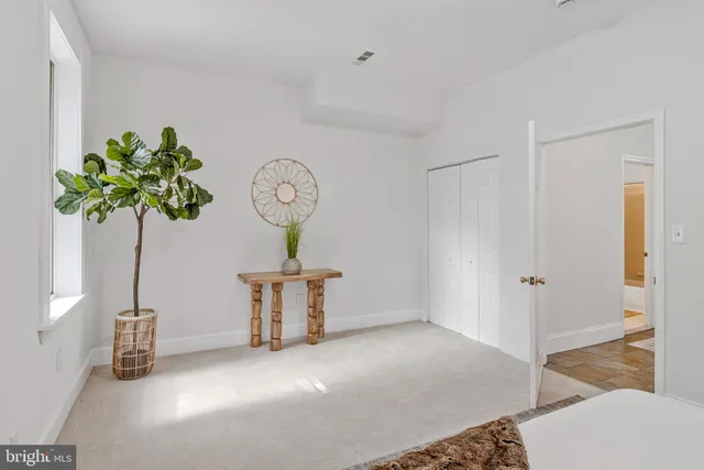 a view of a hallway with entryway