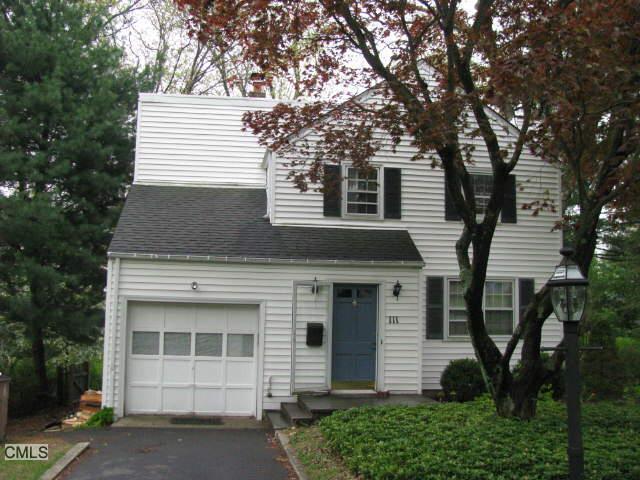 111 Knox Road Stamford, CT 06907 - Photo 1 of 1 a front view of a house with a garden