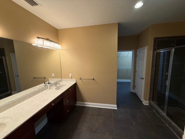 2069 County Highway 83A East Freeport, FL 32439 - Photo 13 of 26 a bathroom with a double vanity sink and mirror