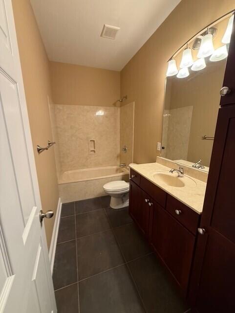 2069 County Highway 83A East Freeport, FL 32439 - Photo 17 of 26 a bathroom with a double vanity sink toilet mirror and bathtub