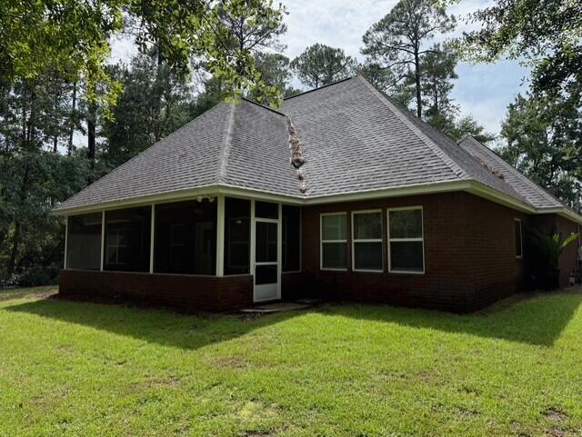 2069 County Highway 83A East Freeport, FL 32439 - Photo 23 of 26 a view of a house with a garden