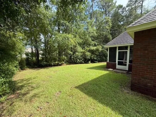 a view of a backyard with a garden