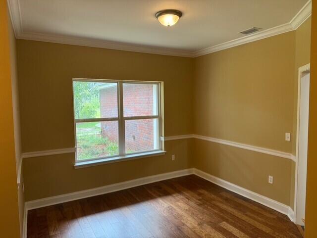 2069 County Highway 83A East Freeport, FL 32439 - Photo 5 of 26 a view of an empty room with wooden floor and a window