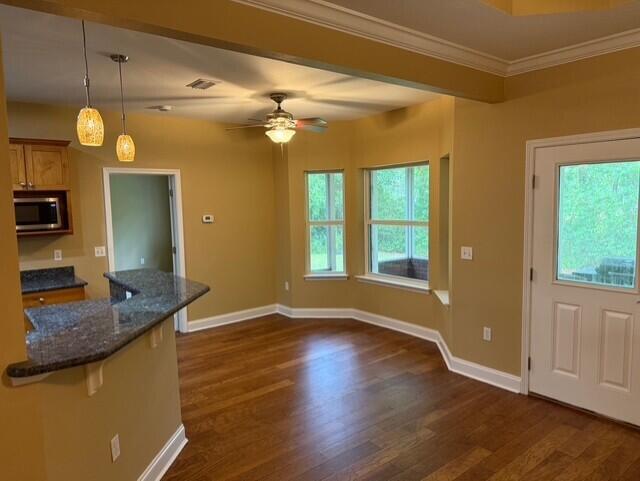2069 County Highway 83A East Freeport, FL 32439 - Photo 6 of 26 a view of a bathroom with a granite countertop sink a mirror and a window