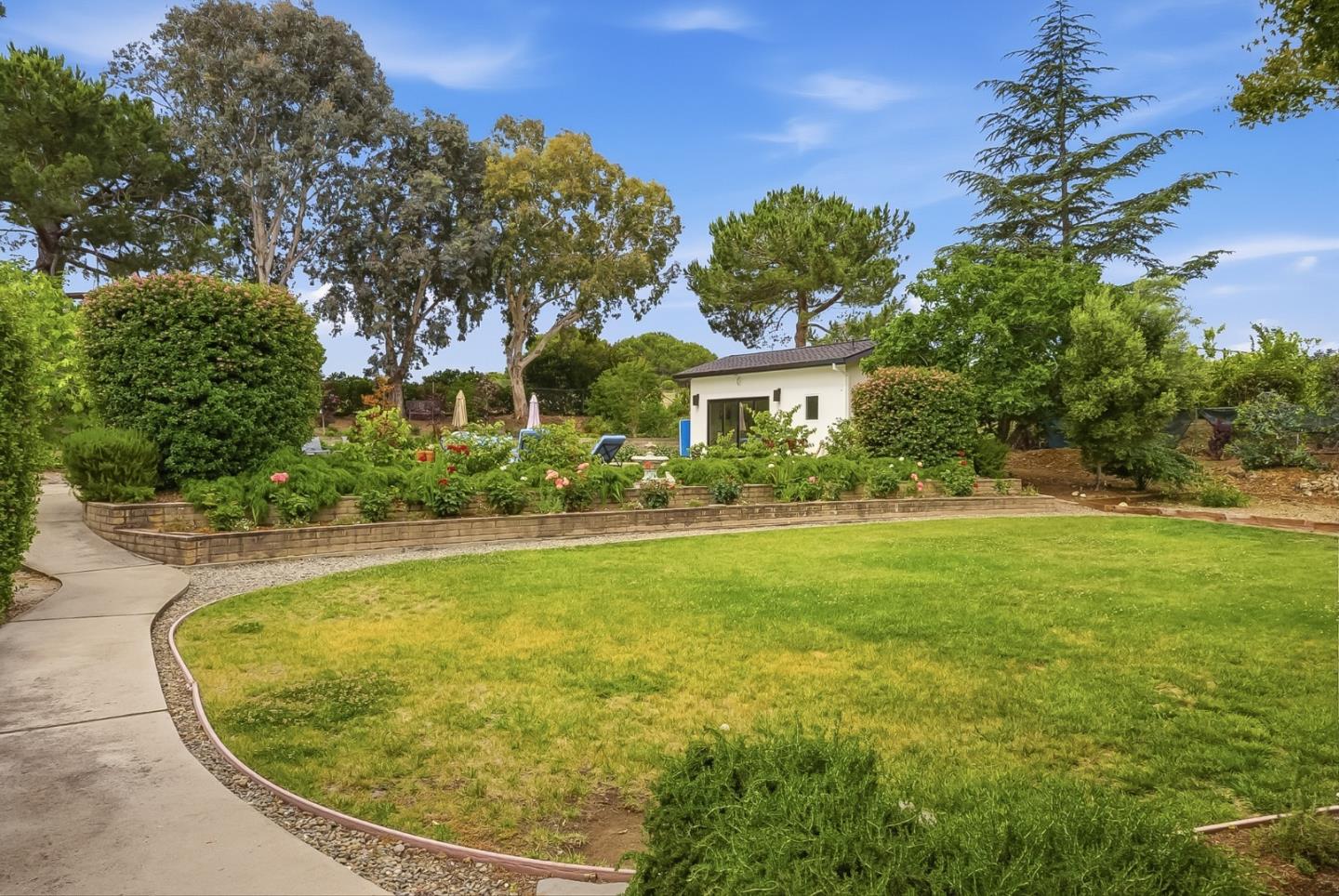 285 Ridgeway Road Woodside, CA 94062 - Photo 25 of 28 a view of a swimming pool with a yard