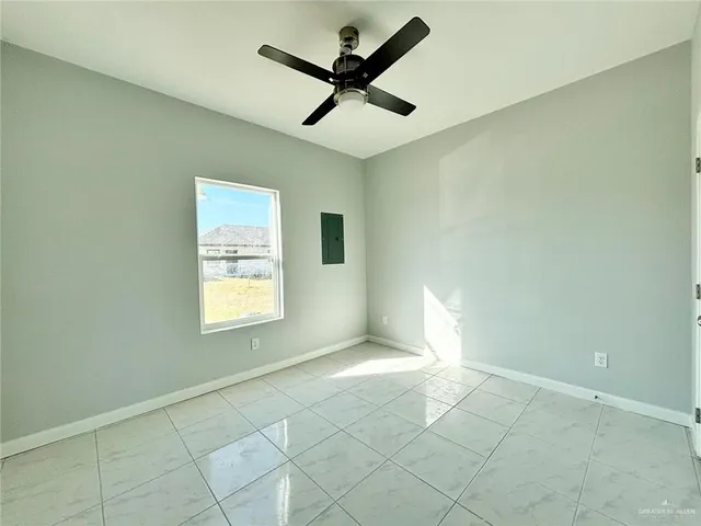 a view of an empty room and window