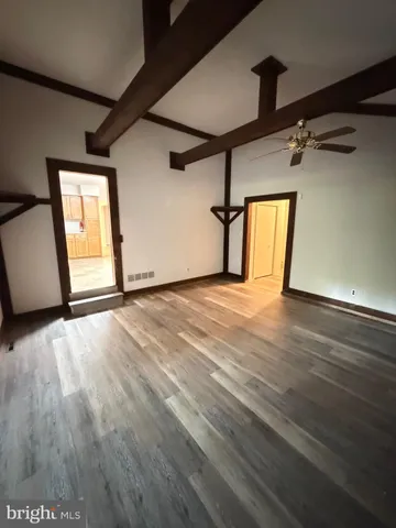 a view of an empty room and window