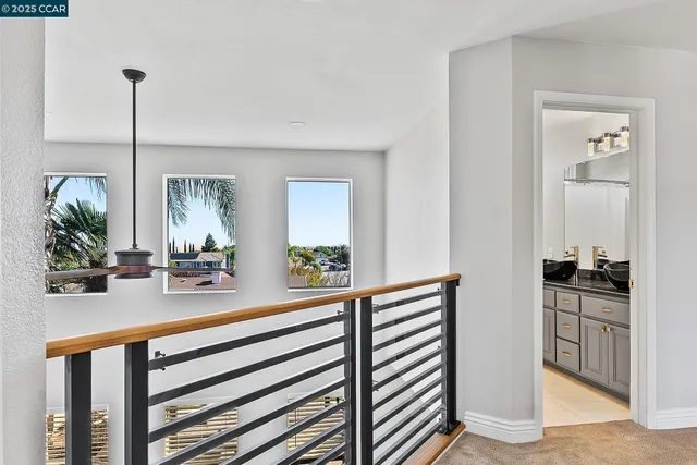a view of a living room and hardwood floor