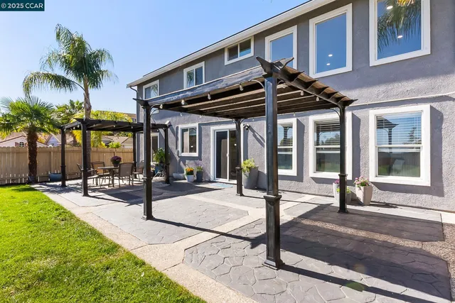 a building exterior with furniture