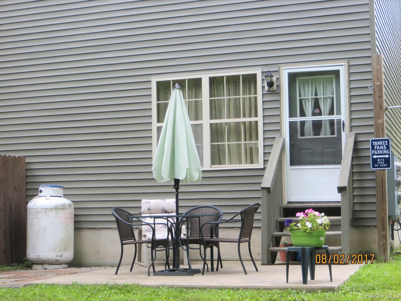 215 Rabbit Run Road Plattekill, NY 12515 - Photo 11 of 14 a front view of a house with patio
