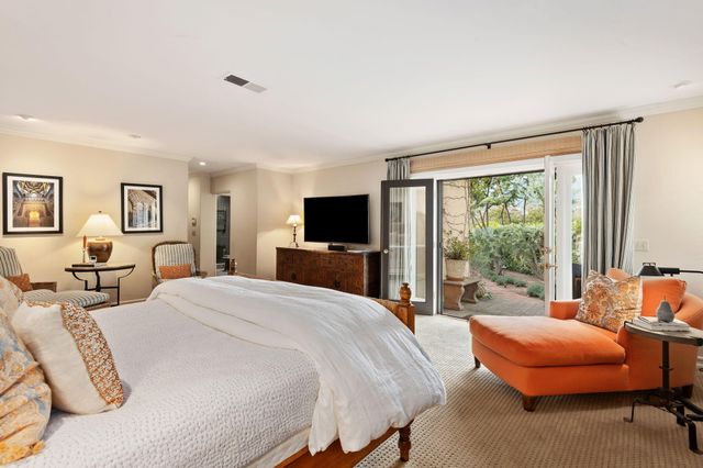a kitchen with a sink and a large window