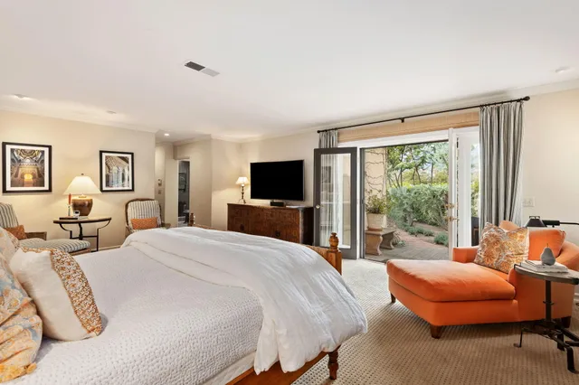 a kitchen with a sink and a large window