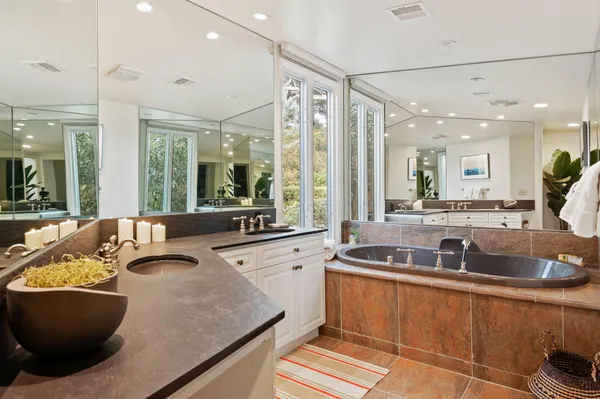 a living room with furniture fireplace and a flat screen tv