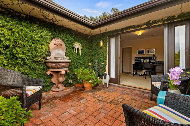 a bathroom with a sink mirror vanity and toilet