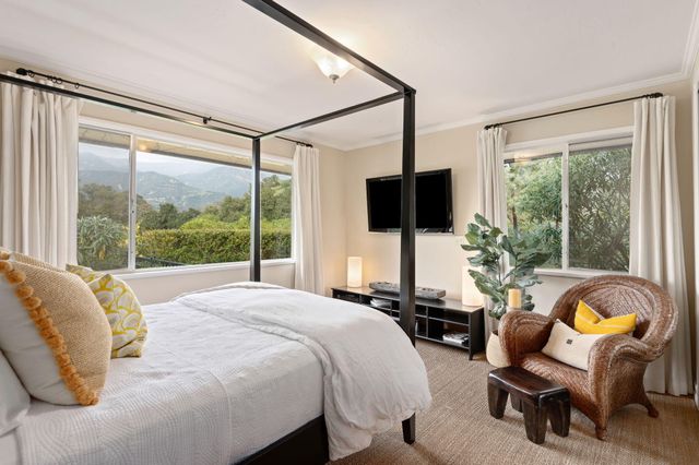a bathroom with a sink vanity and mirror