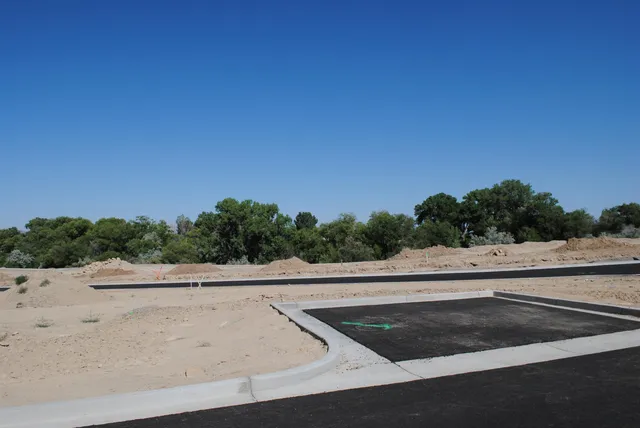 a view of a road and a yard
