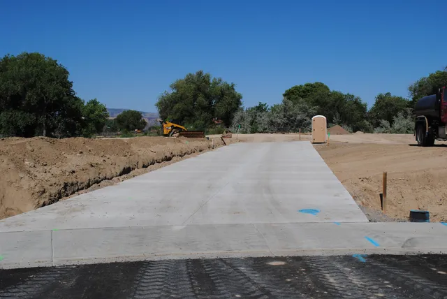 a view of a road with a yard