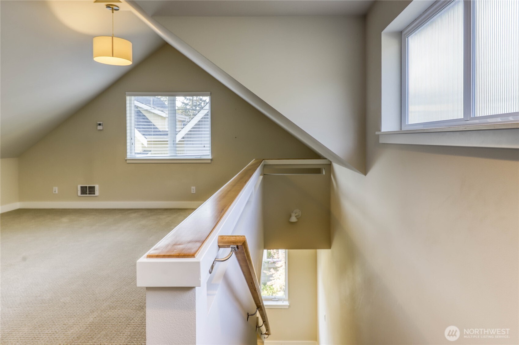 690 Wintersweet Road Northeast Bainbridge Island, WA 98110 - Photo 21 of 23 a view of a hallway with entryway