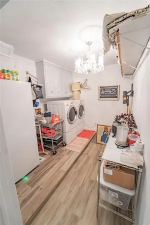 a bathroom with a sink mirror vanity and toilet