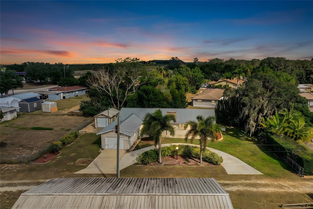 1305 Arbuckle Creek Road Sebring, FL 33870 - Photo 2 of 71 a view of a terrace with sitting area