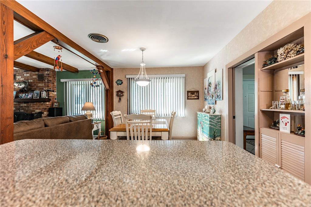 1305 Arbuckle Creek Road Sebring, FL 33870 - Photo 25 of 71 a living room with furniture and a large window