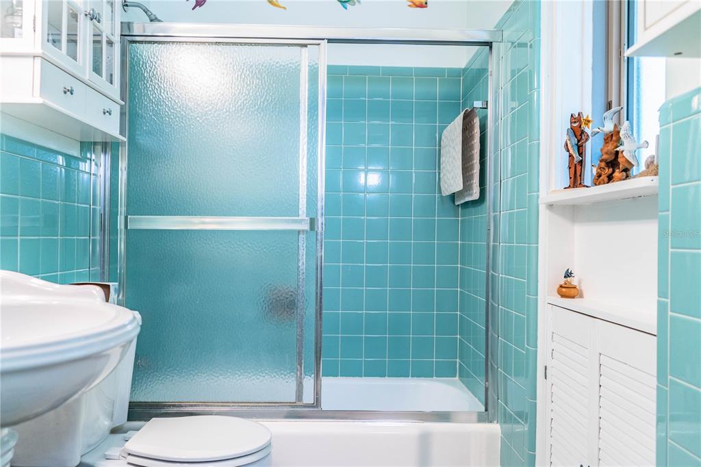 1305 Arbuckle Creek Road Sebring, FL 33870 - Photo 33 of 71 a bathroom with a shower and a toilet