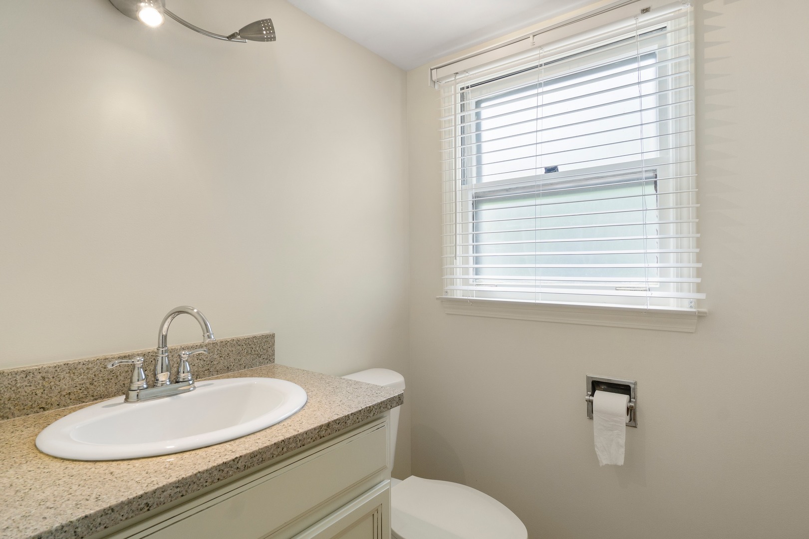 49 Mulberry Road Deerfield, IL 60015 - Photo 11 of 17 a bathroom with a toilet sink and mirror