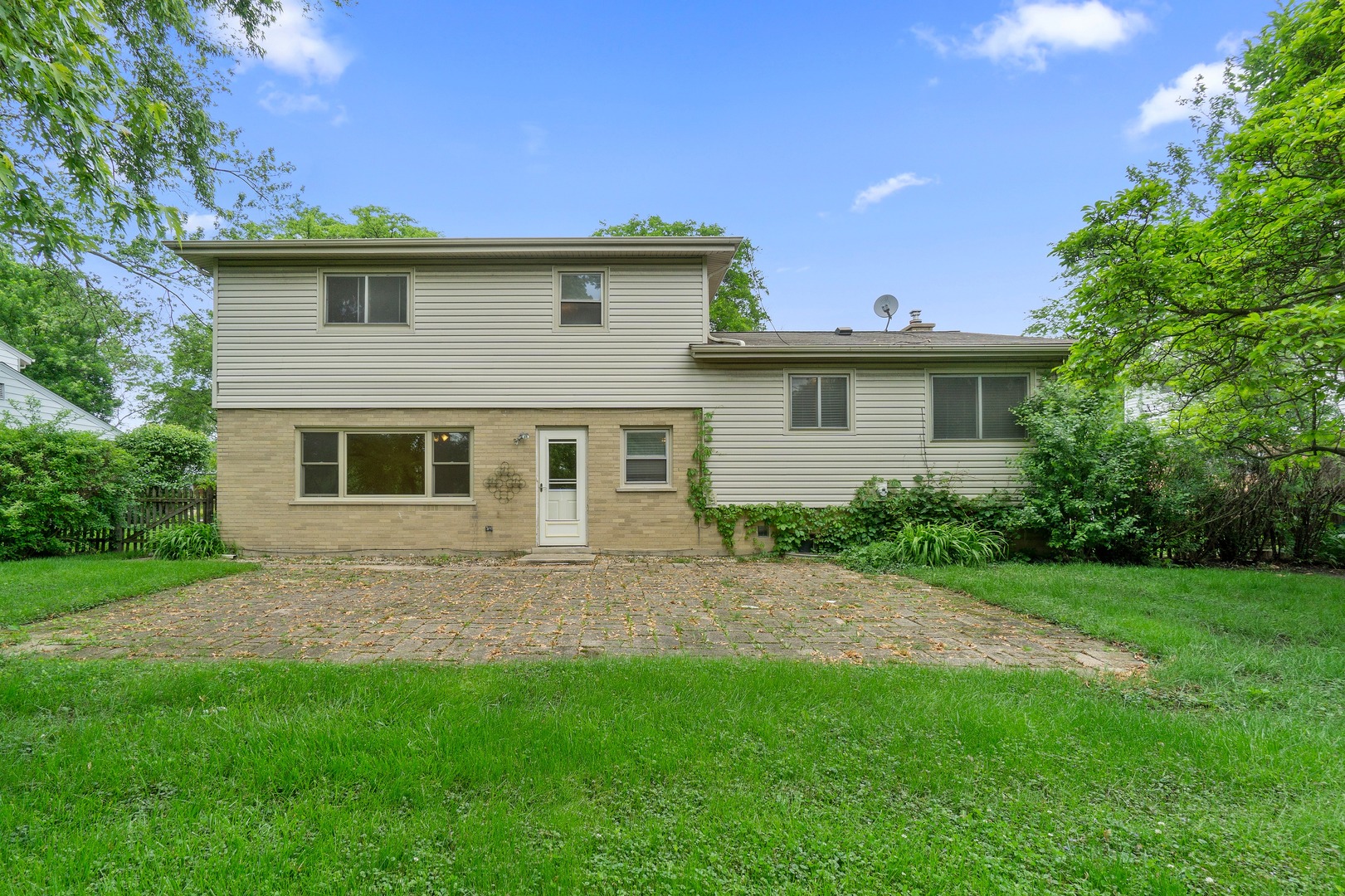 49 Mulberry Road Deerfield, IL 60015 - Photo 16 of 17 a view of a house with a yard
