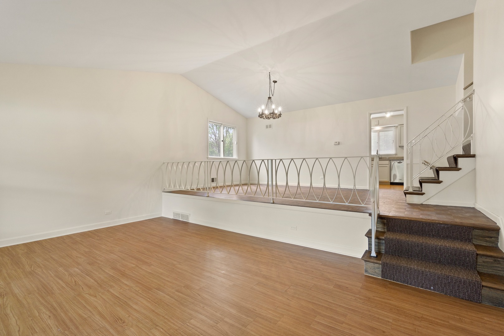 49 Mulberry Road Deerfield, IL 60015 - Photo 4 of 17 a view of an empty room with wooden floor and a fireplace