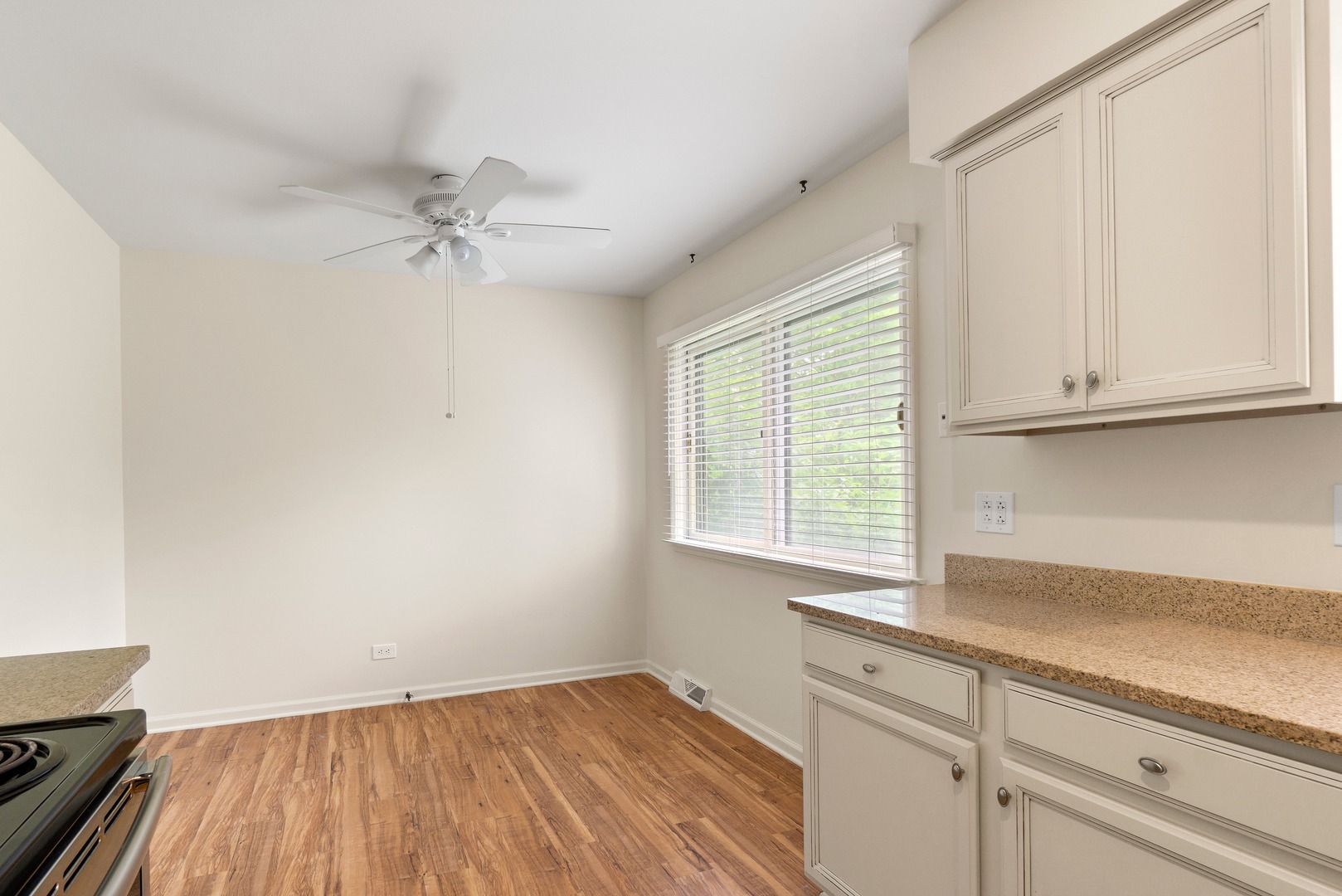 49 Mulberry Road Deerfield, IL 60015 - Photo 8 of 17 wooden floor in an empty room with a window