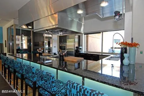 a view of a living room and kitchen