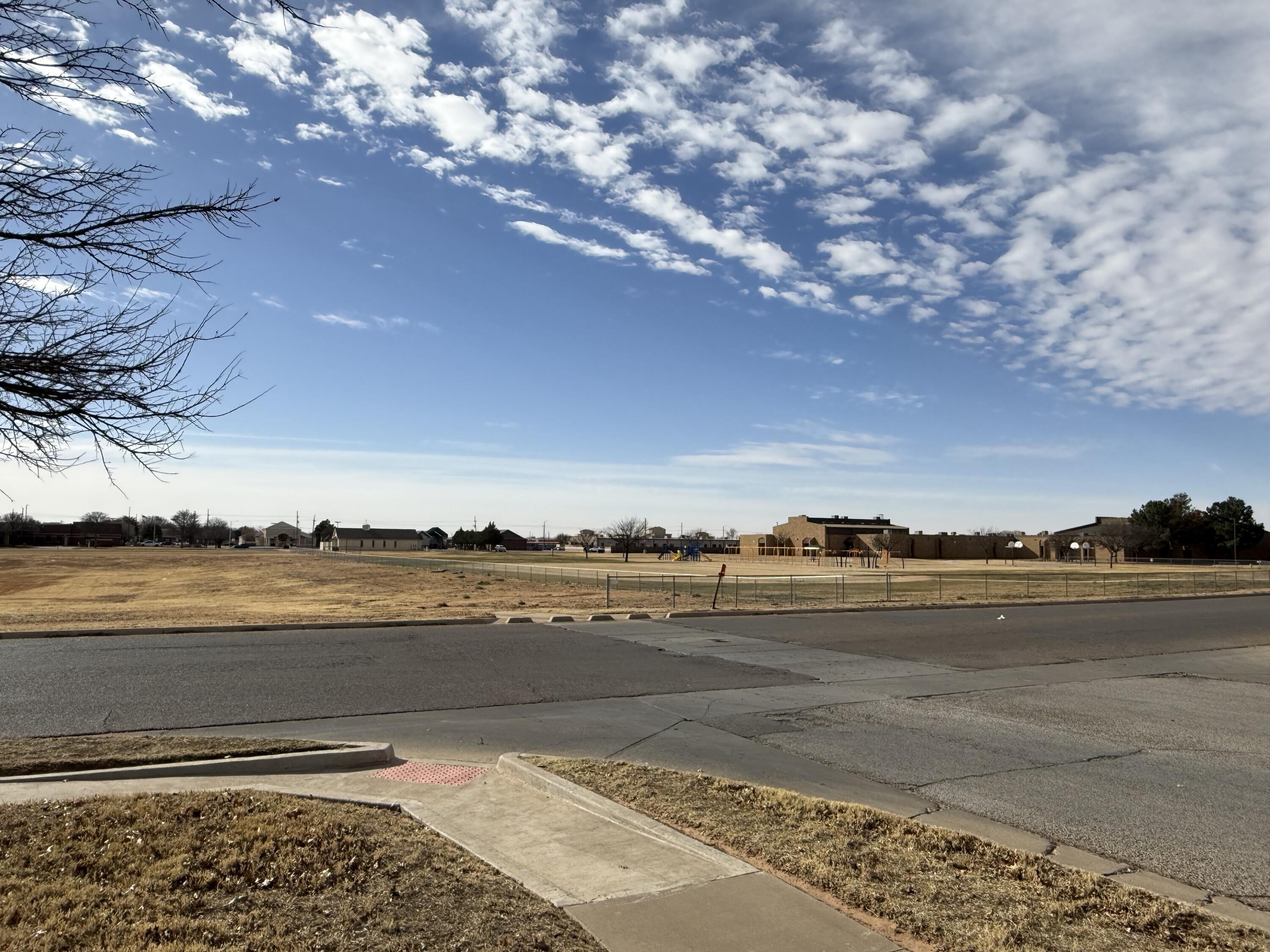 7807 Homestead Avenue Lubbock, TX 79424 - Photo 30 of 31 a view of an ocean and beach