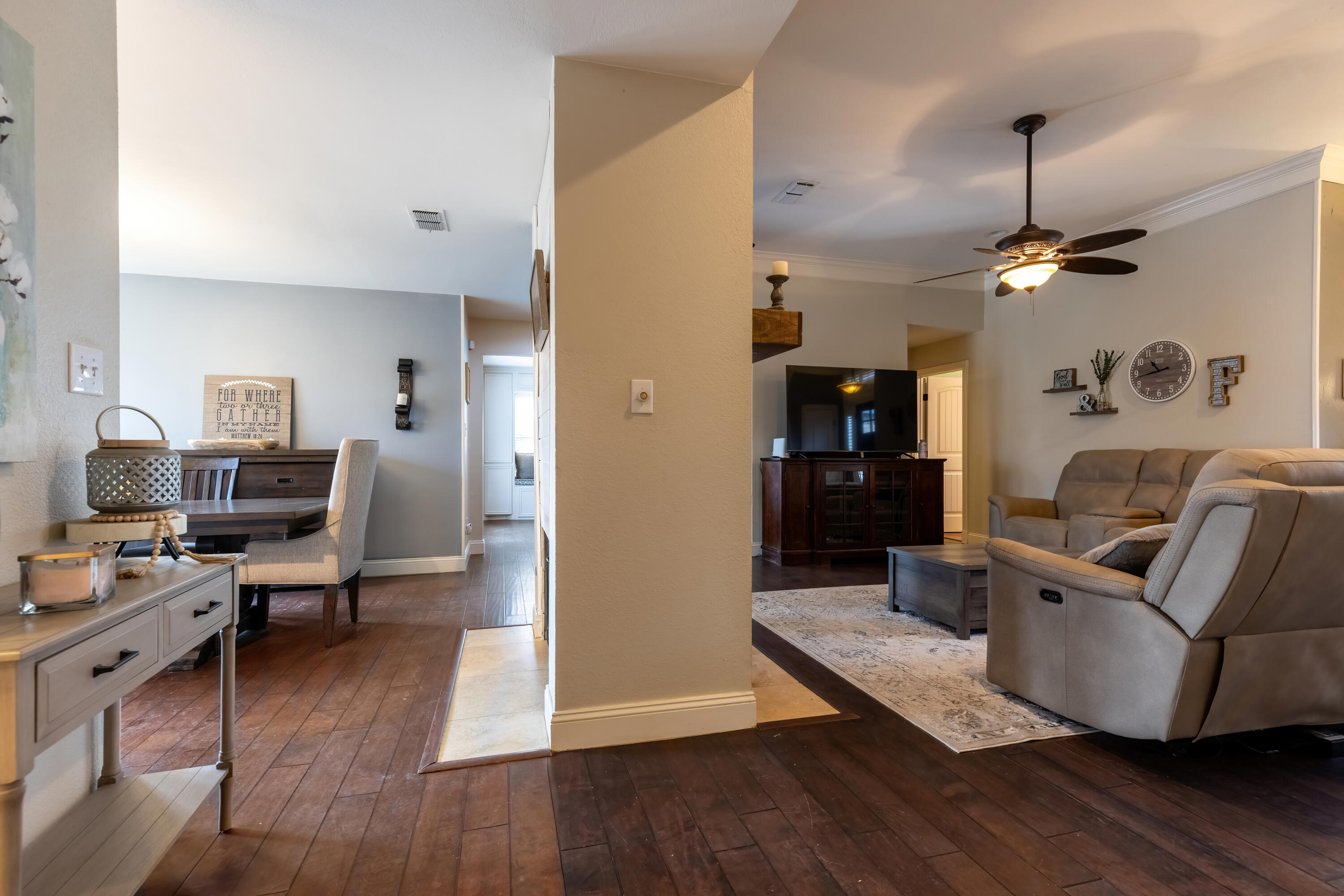 7807 Homestead Avenue Lubbock, TX 79424 - Photo 5 of 31 a living room with furniture and a wooden floor