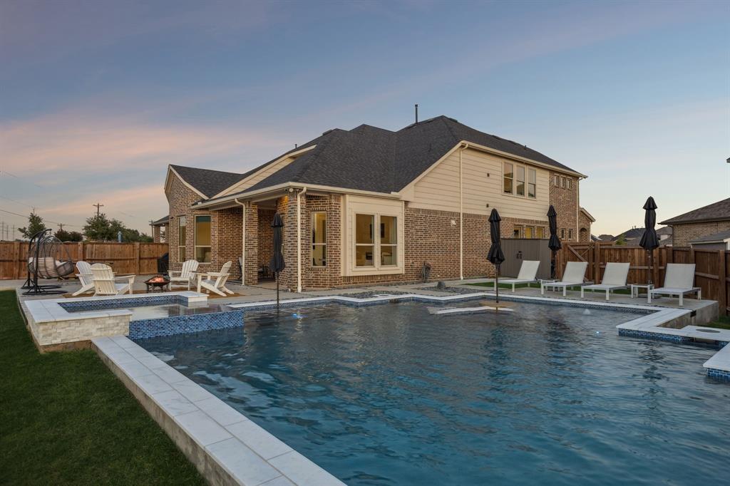 a front view of a house with swimming pool