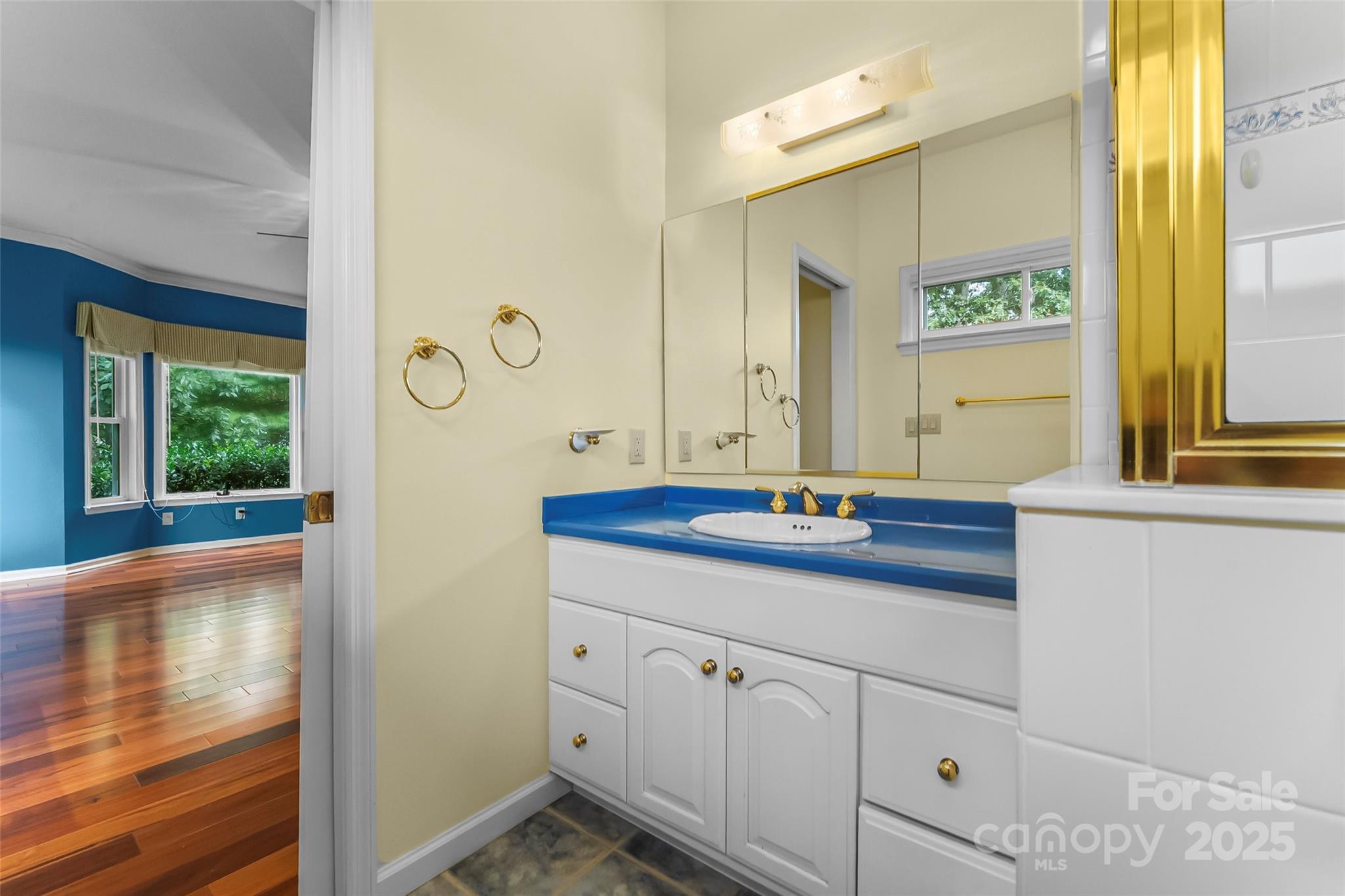 506 Kings Ridge Asheville, NC 28804 - Photo 18 of 44 a bathroom with a granite countertop sink and a mirror