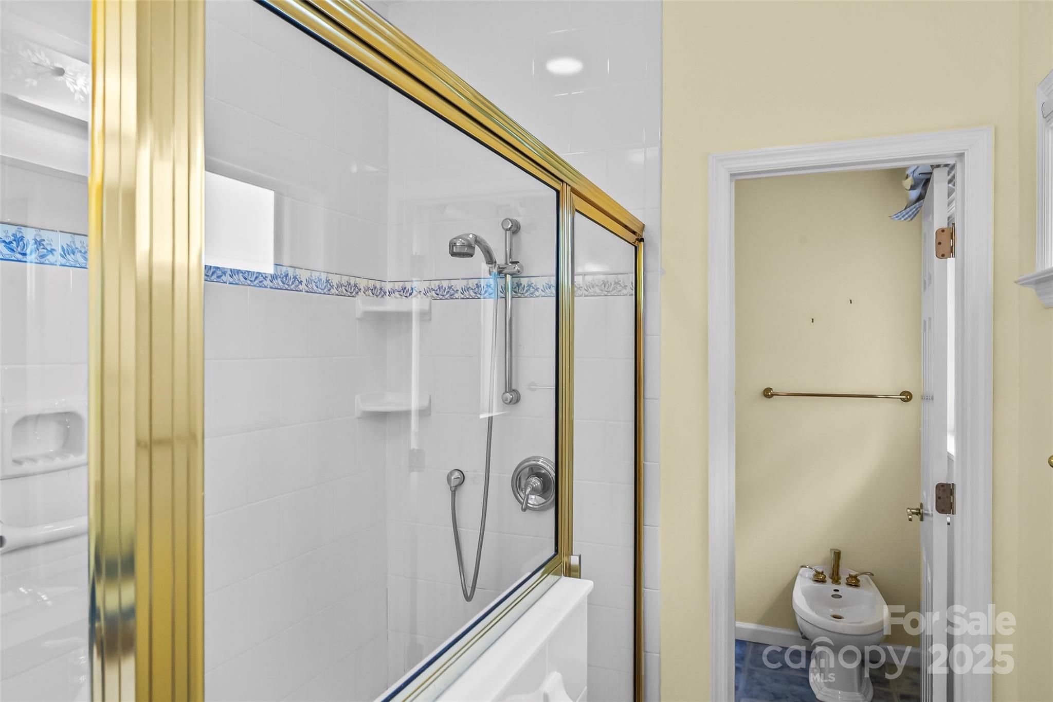 506 Kings Ridge Asheville, NC 28804 - Photo 19 of 44 a bathroom with a shower and a sink