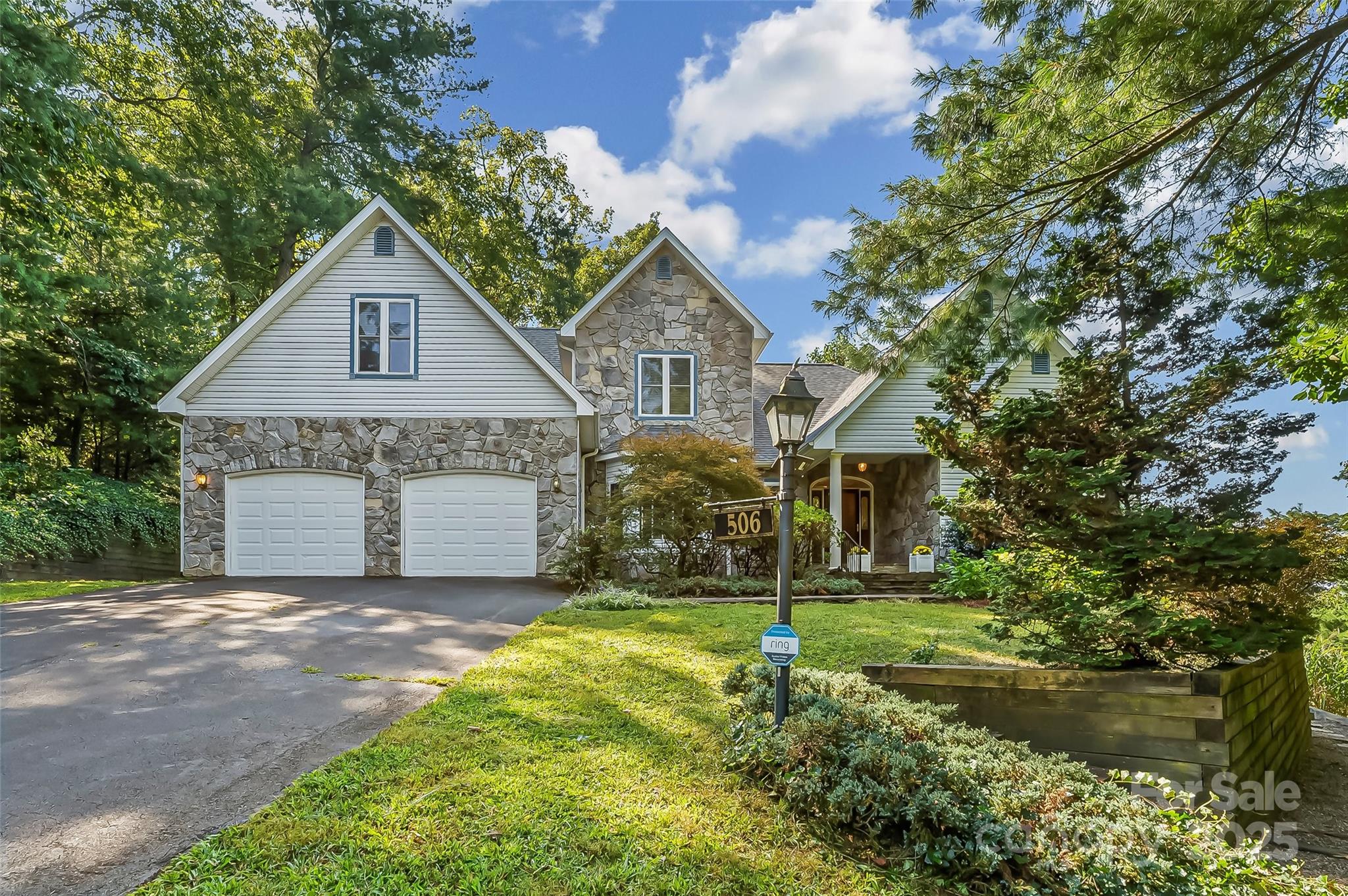 506 Kings Ridge Asheville, NC 28804 - Photo 2 of 44 a front view of a house with a garden and yard