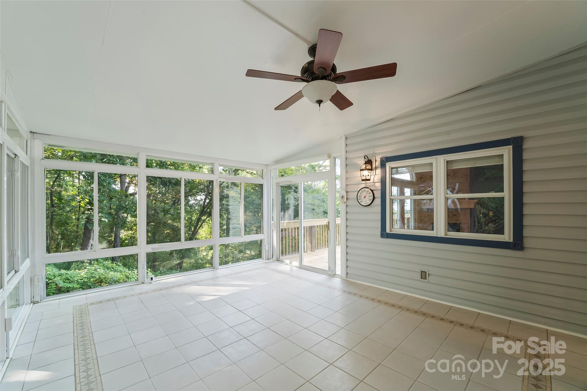 506 Kings Ridge Asheville, NC 28804 - Photo 30 of 44 a view of an empty room with a window