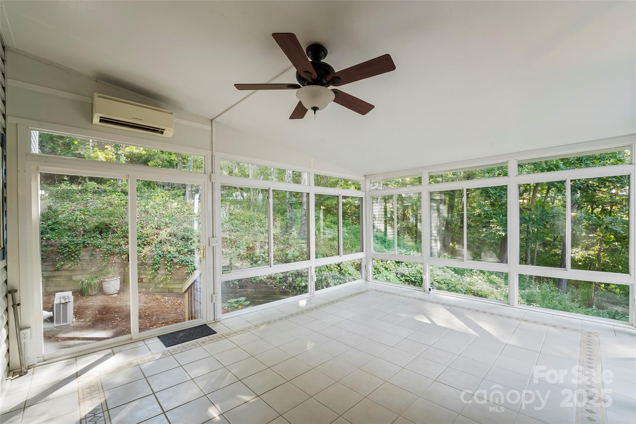 506 Kings Ridge Asheville, NC 28804 - Photo 31 of 44 a living room with a large window