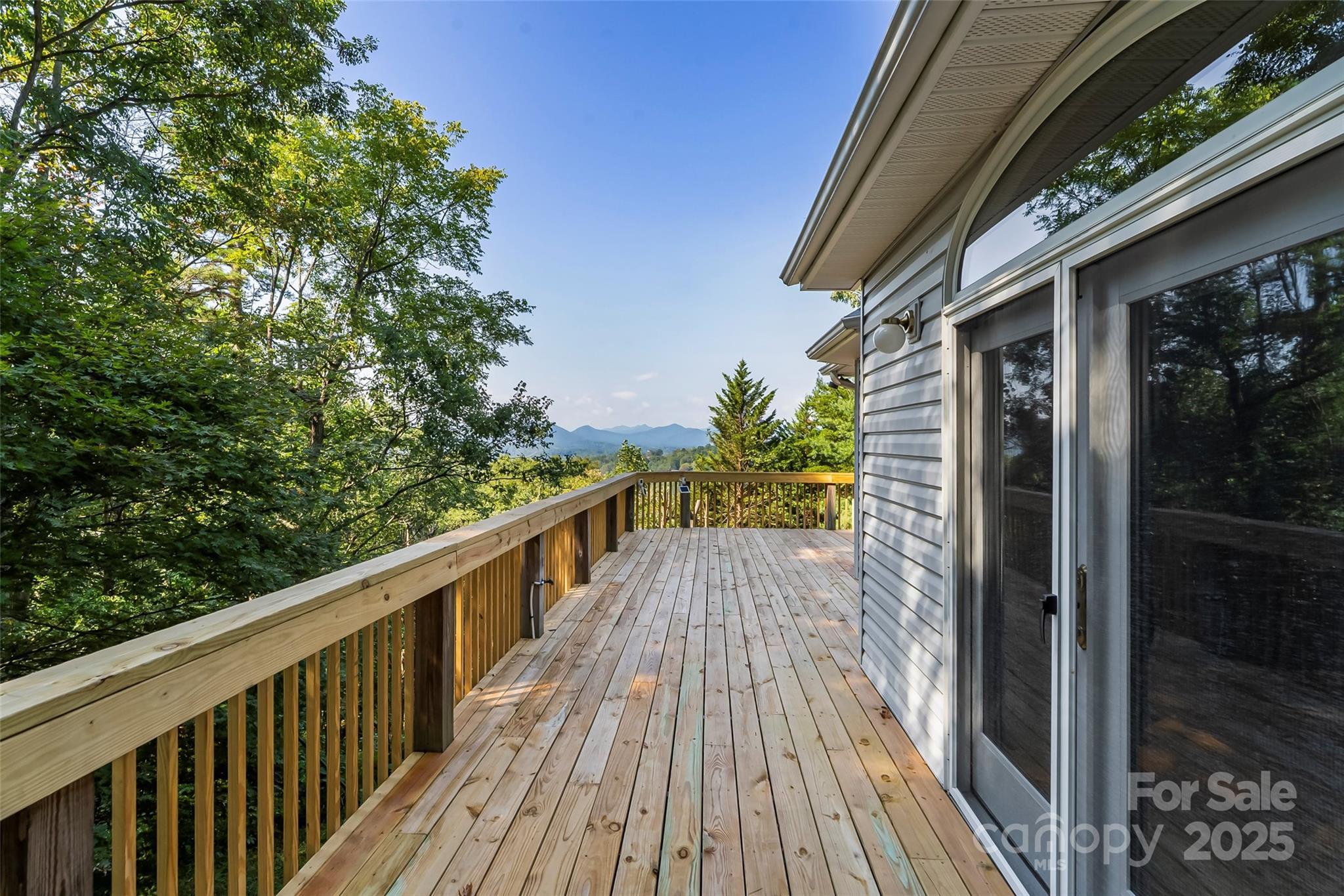 506 Kings Ridge Asheville, NC 28804 - Photo 36 of 44 a view of balcony with wooden floor