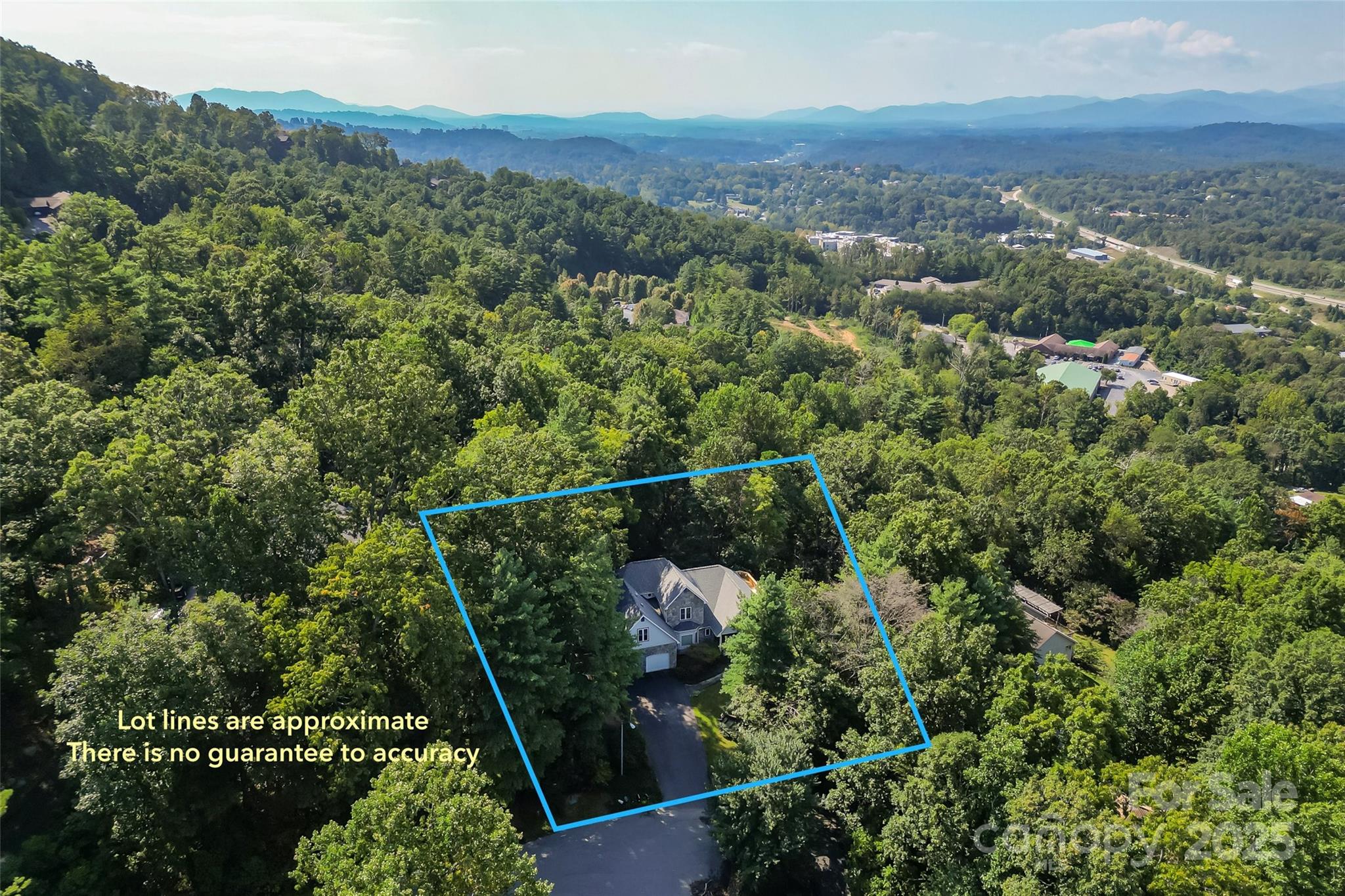 506 Kings Ridge Asheville, NC 28804 - Photo 40 of 44 an aerial view of a house with a yard