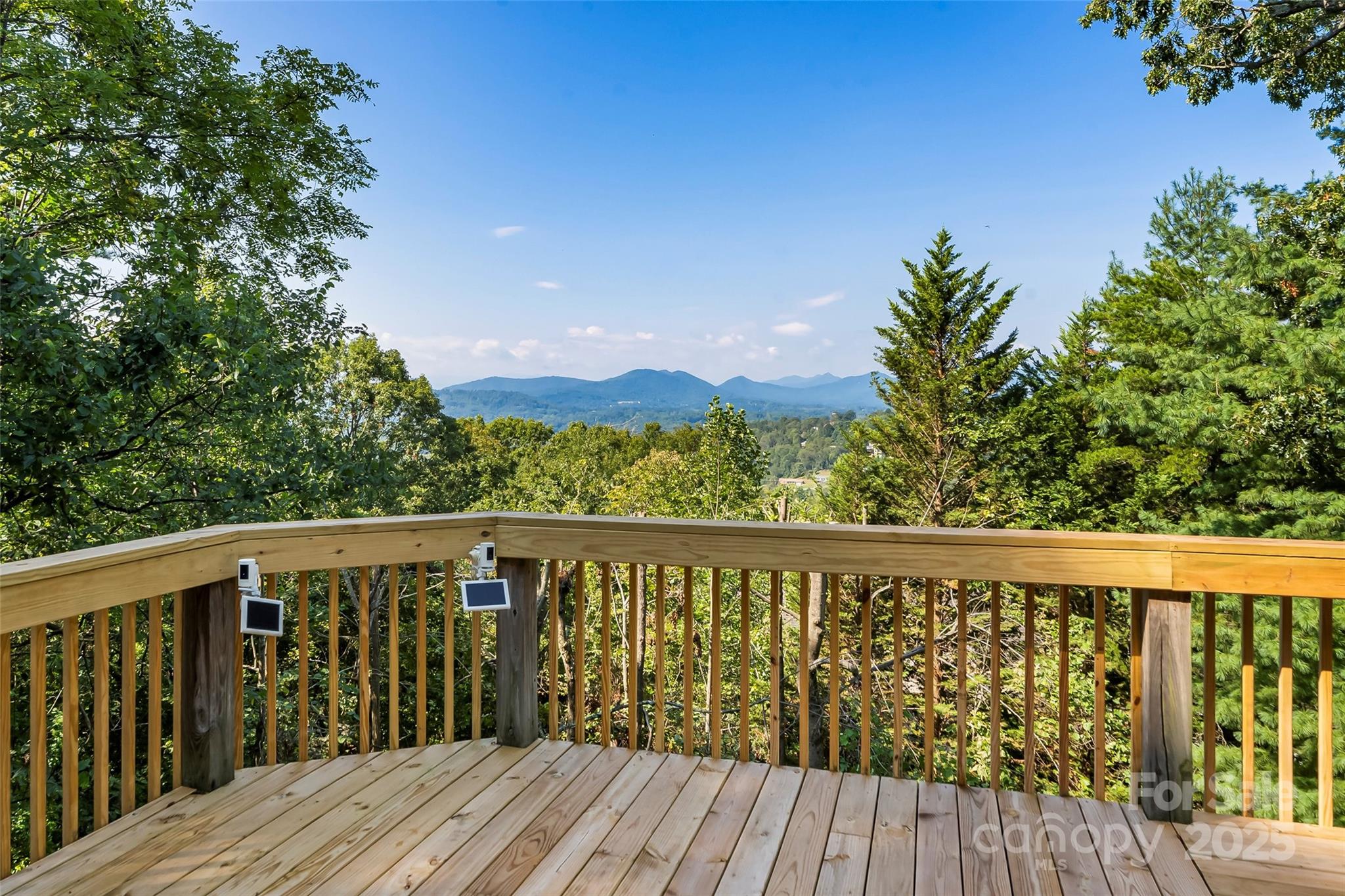 506 Kings Ridge Asheville, NC 28804 - Photo 4 of 44 a balcony with wooden floor and fence