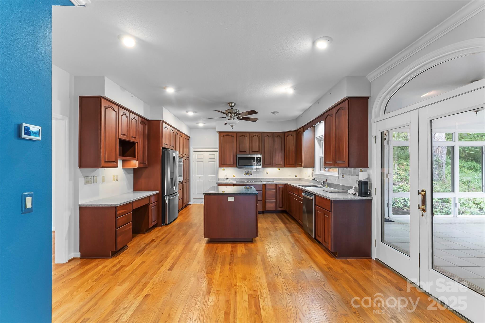 506 Kings Ridge Asheville, NC 28804 - Photo 10 of 44 a large kitchen with stainless steel appliances lots of counter top space