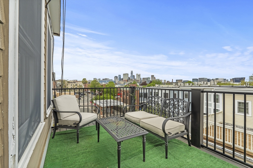 320 West Broadway, Unit 6 Boston, MA 02127 - Photo 13 of 14 a view of a balcony with chairs