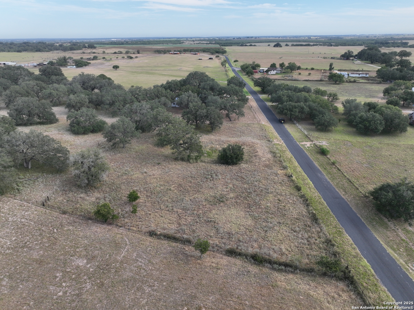 Tbd Broom Road Pleasanton, TX 78064 - Photo 9 of 10 a view of a dry yard with wooden floor and lake view
