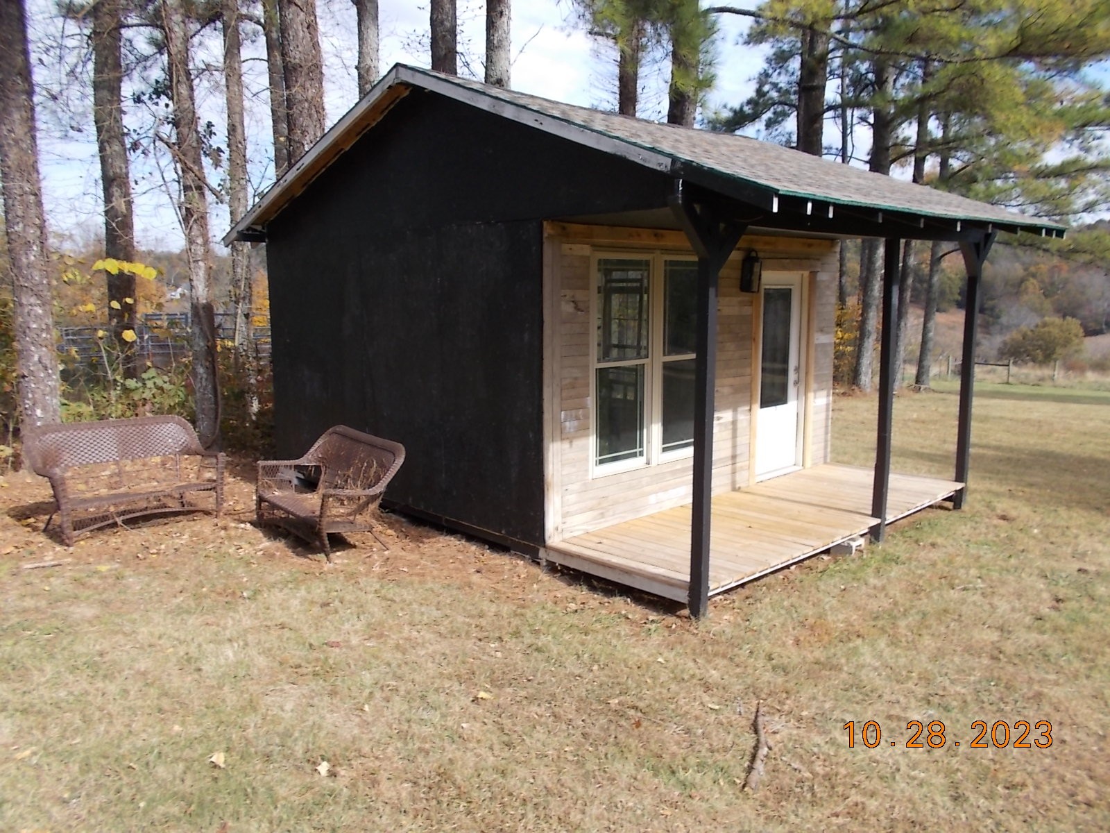260 Round Top Road Alexandria, TN 37012 - Photo 12 of 65 a backyard of a house with table and chairs